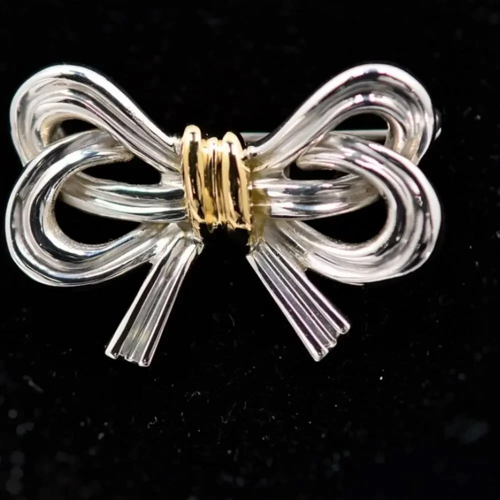 Authentic  Tiffany & Co. Sterling Silver and 18k Yellow Gold Ribbon Bow brooch